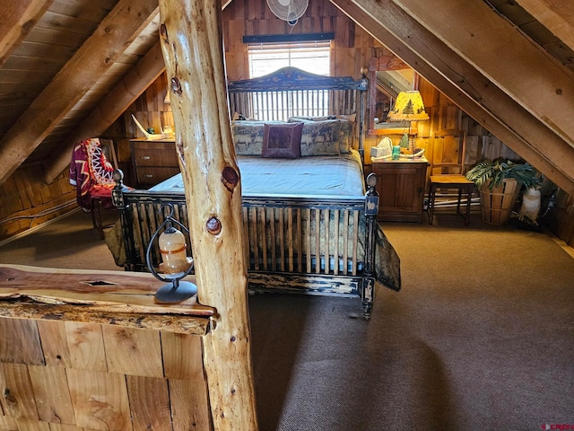 bedroom featuring wood walls, lofted ceiling with beams, carpet flooring, and wooden ceiling