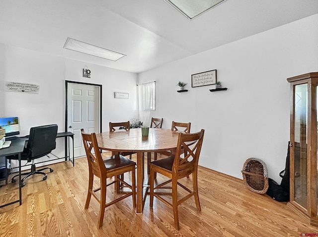 dining area featuring light hardwood / wood-style floors