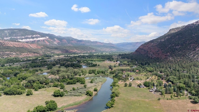 mountain view featuring a water view