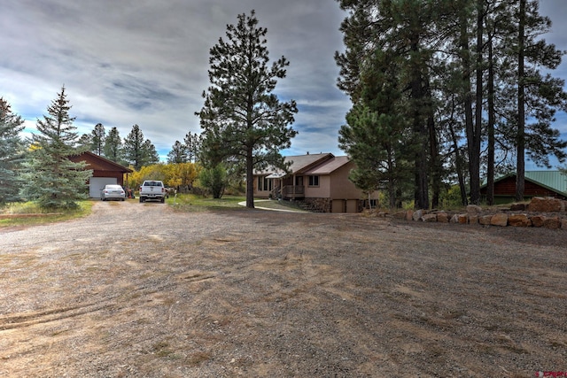 view of yard featuring a garage