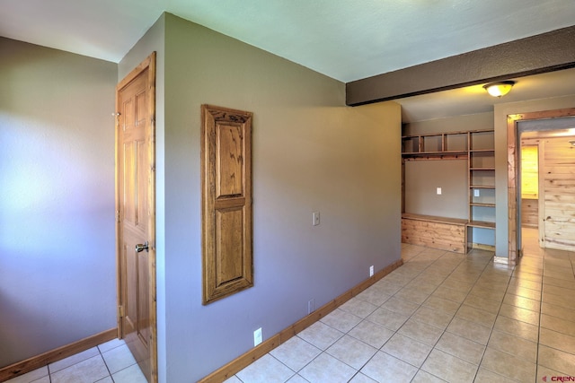 view of tiled spare room