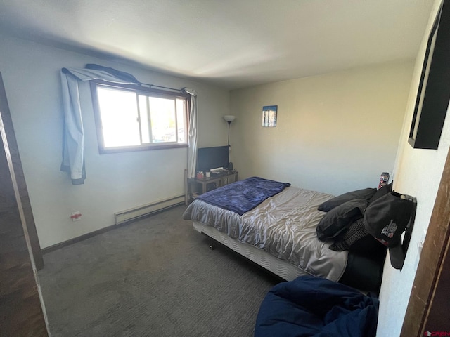 carpeted bedroom featuring a baseboard radiator