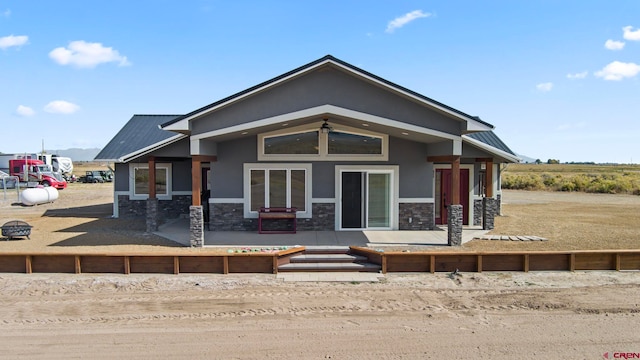 view of front of house featuring a patio