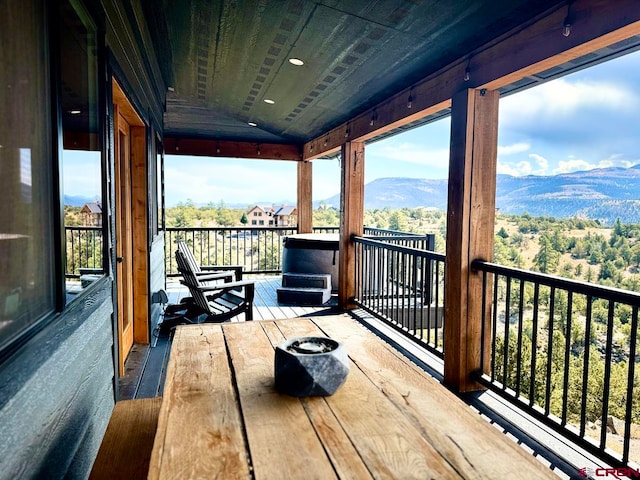 balcony featuring a mountain view