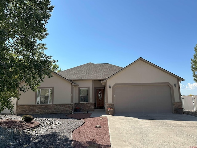 single story home featuring a garage