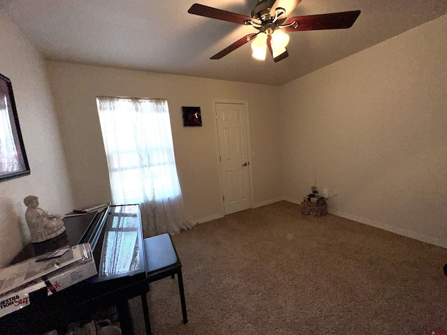 carpeted office with ceiling fan