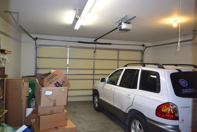 garage featuring a garage door opener