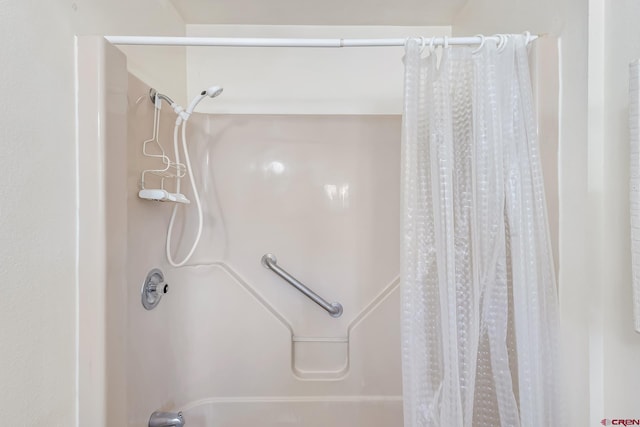 bathroom featuring a shower with curtain