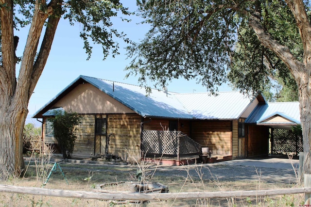 view of front of house with a carport