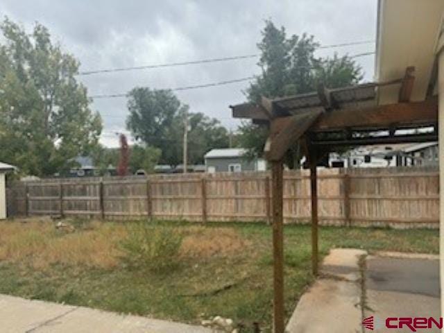 view of yard with a carport