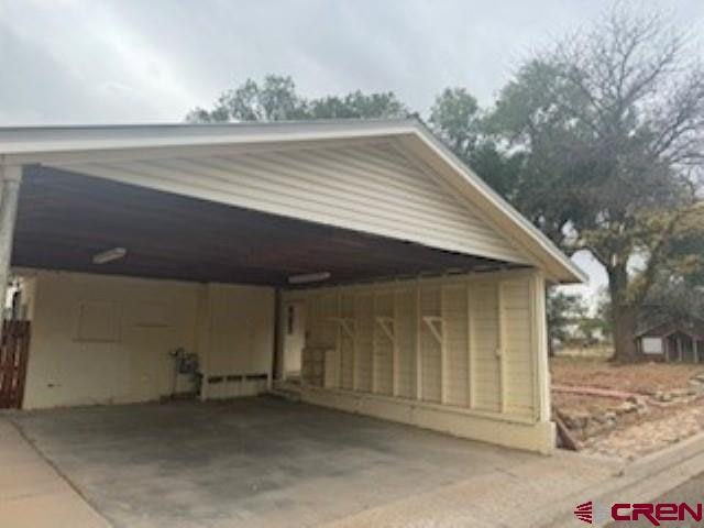 view of car parking with a carport