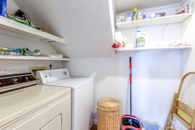 laundry area with independent washer and dryer