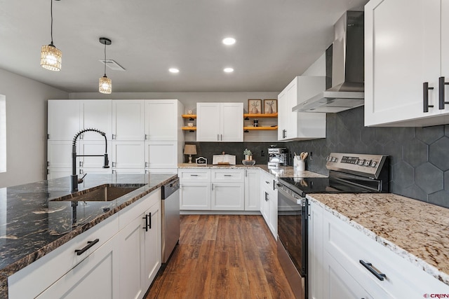 kitchen featuring dark wood-type flooring, white cabinetry, stainless steel appliances, and sink