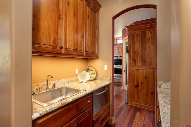 2239 Mockingbird Valley Ct, Durango, CO 81301 - kitchen with a sink, dark wood-style floors, double oven, and a warming drawer
