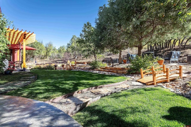 2239 Mockingbird Valley Ct, Durango, CO 81301 - view of green lawn featuring a pergola