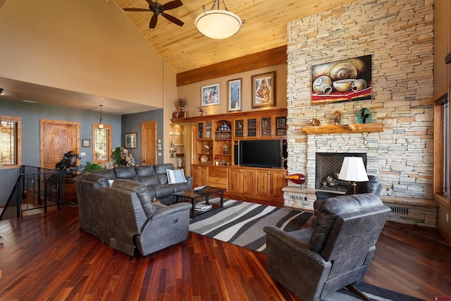 2239 Mockingbird Valley Ct, Durango, CO 81301 - living area with high vaulted ceiling, wood finished floors, ceiling fan, a fireplace, and wood ceiling