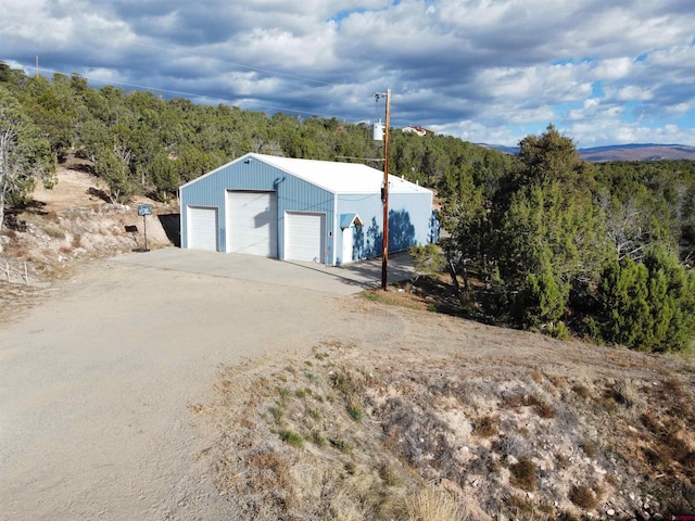 exterior space with a garage