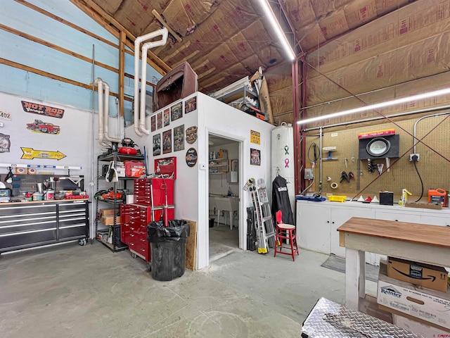 garage with a workshop area