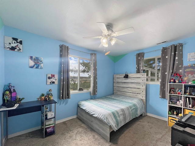 carpeted bedroom featuring ceiling fan