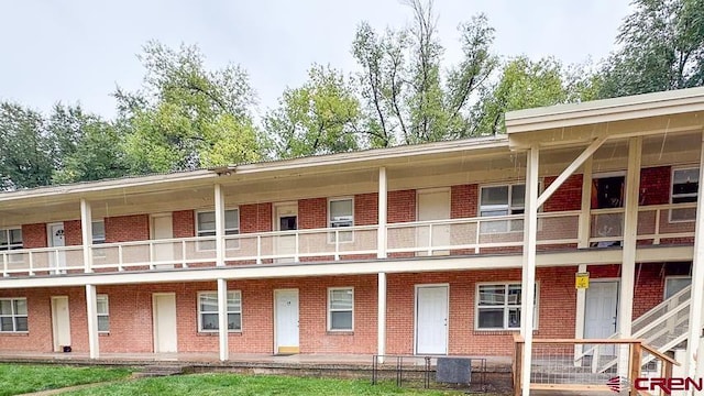 view of building exterior with central AC