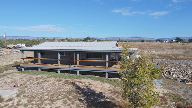 exterior space featuring a mountain view