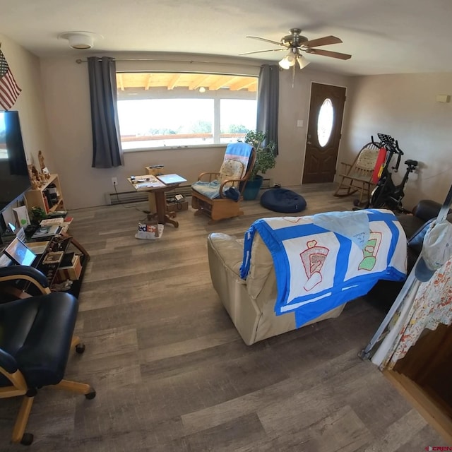 interior space featuring hardwood / wood-style flooring and ceiling fan