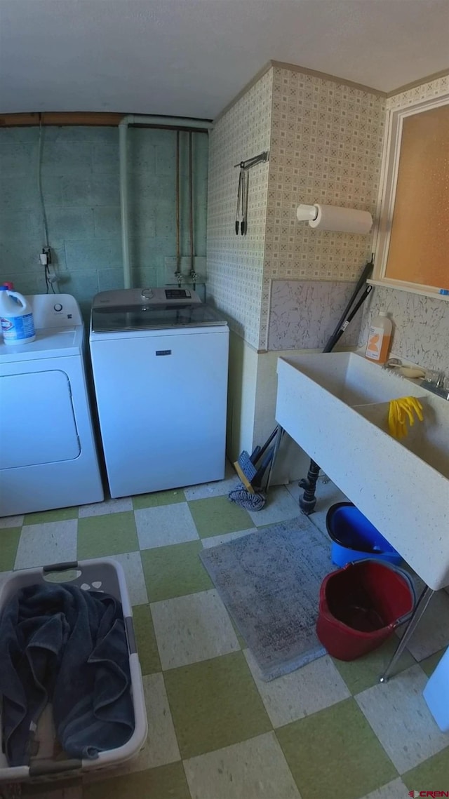 laundry room with washer and clothes dryer