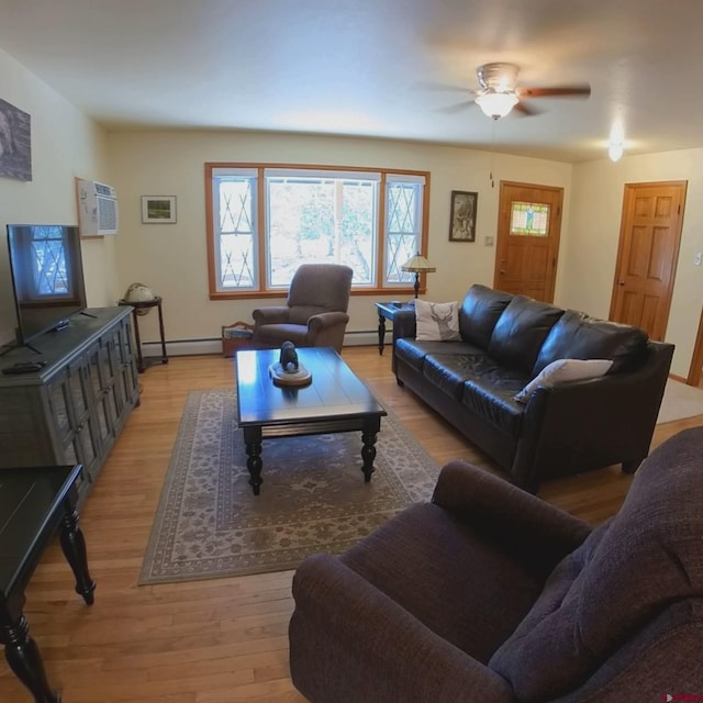 living room with light hardwood / wood-style floors, a wall mounted AC, baseboard heating, and ceiling fan