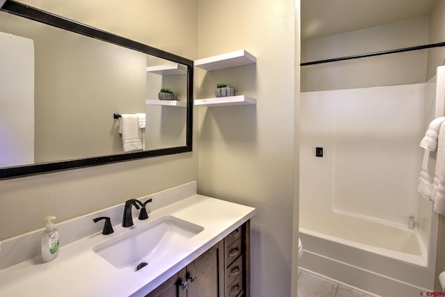 bathroom featuring vanity and shower / tub combination