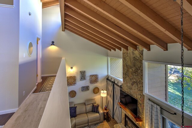 33 Davis Cup Unit 4008, Pagosa Springs, CO 81147 - living area featuring wooden ceiling, healthy amount of natural light, wood finished floors, and baseboards