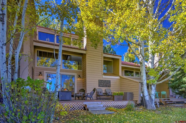 33 Davis Cup Unit 4008, Pagosa Springs, CO 81147 - back of property with a deck and a lawn