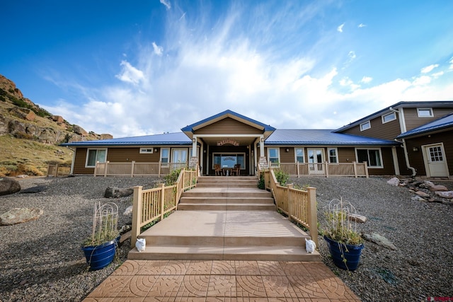 view of front of property featuring covered porch