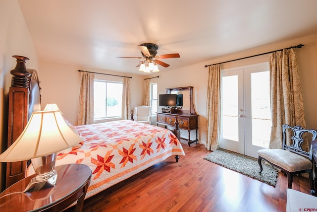 bedroom with french doors, access to exterior, hardwood / wood-style flooring, and ceiling fan