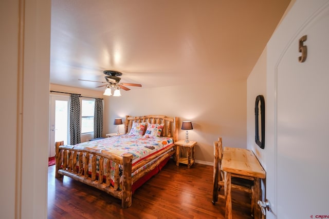 bedroom featuring dark hardwood / wood-style floors and ceiling fan