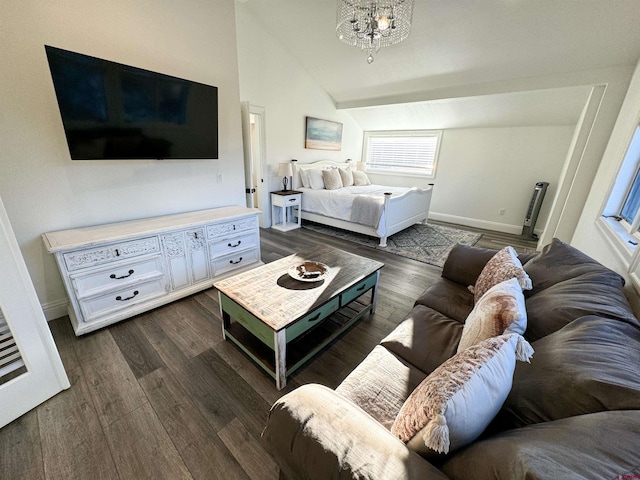 bedroom with a chandelier, vaulted ceiling, and dark hardwood / wood-style flooring