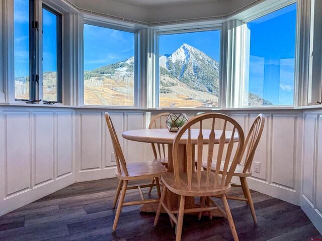 sunroom with a mountain view