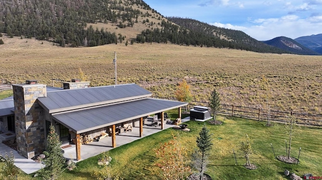 view of mountain feature with a rural view