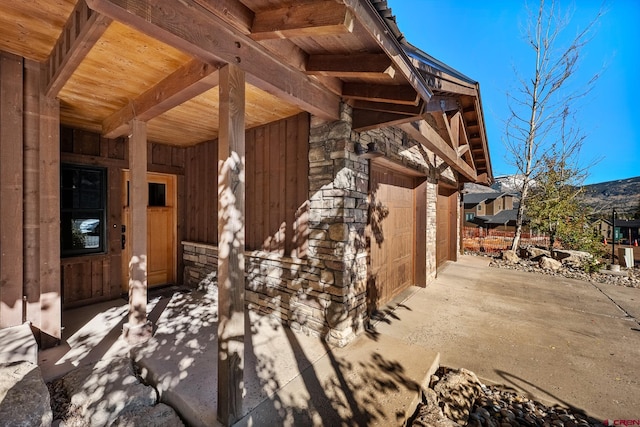 view of side of property featuring a garage