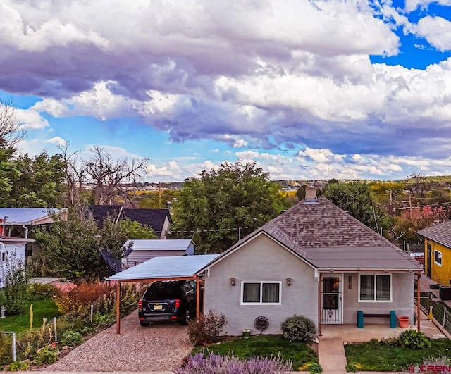 view of front of house with a carport