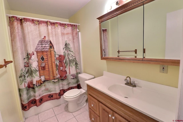 bathroom featuring vanity, toilet, and tile patterned floors