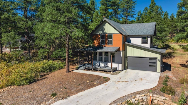 view of front of property with a garage