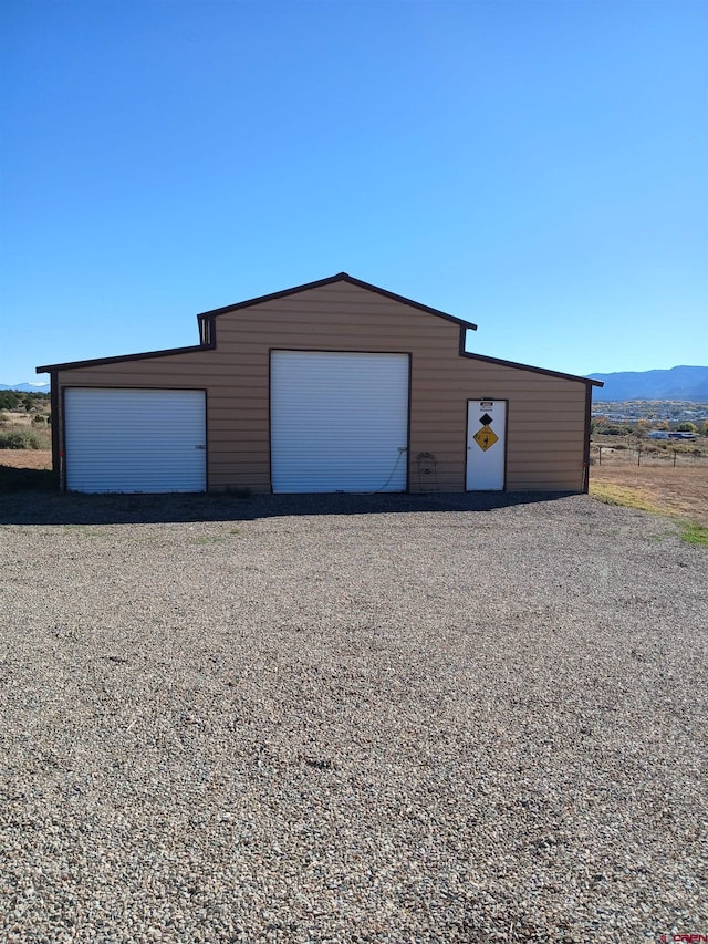 garage featuring a mountain view