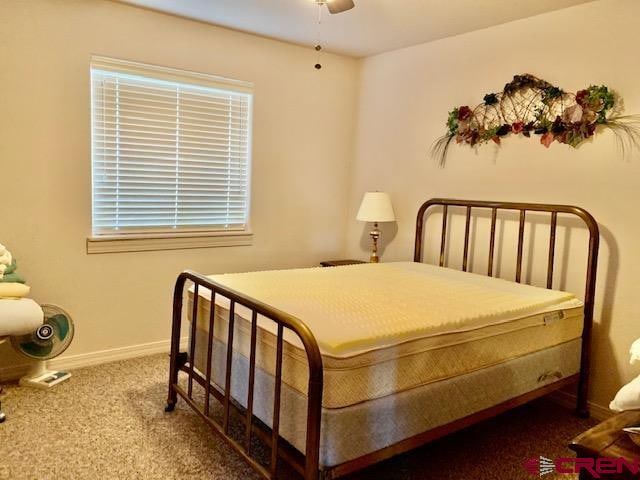 bedroom featuring carpet floors and ceiling fan