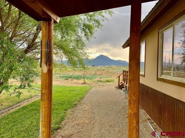 yard at dusk with a mountain view