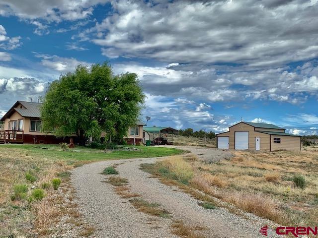 22989 Rd G.5, Cortez, CO 81321 - view of street featuring driveway