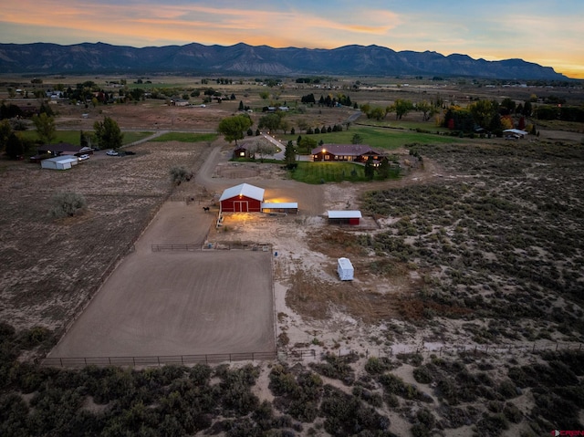 aerial view at dusk with a mountain view