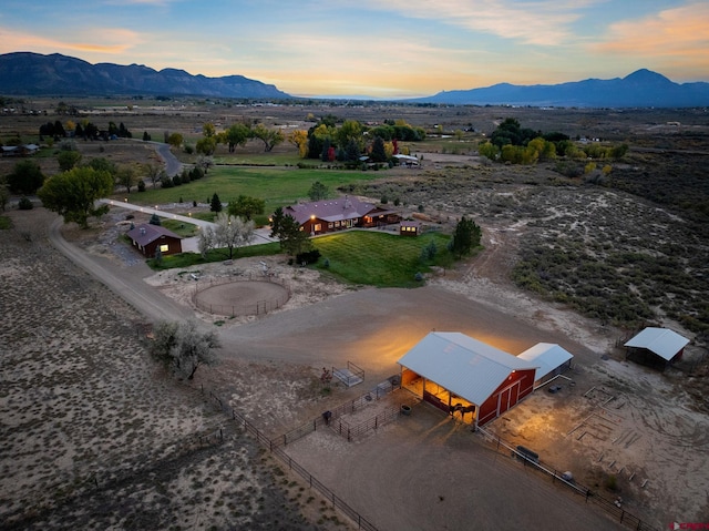 aerial view at dusk with a mountain view