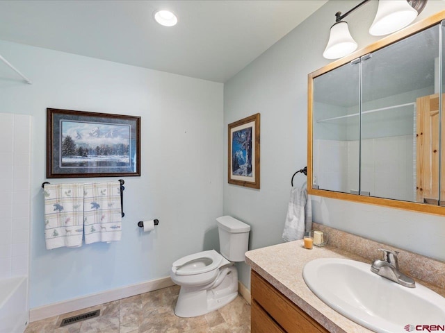 full bathroom with toilet, vanity, and washtub / shower combination