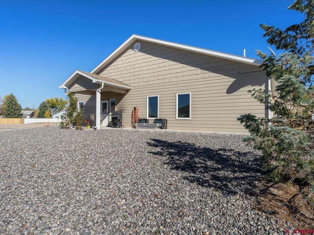 back of property with a patio area