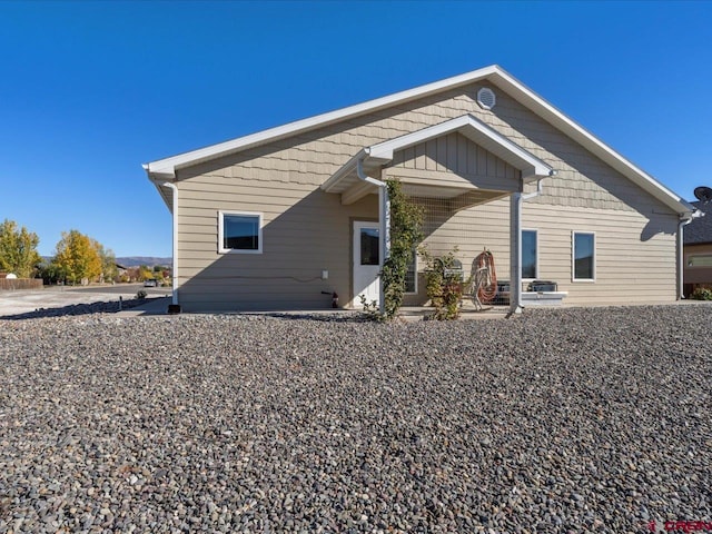 back of property featuring a patio area